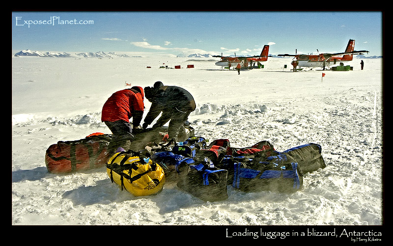 Loading luggage in a blizzard, Antarctica