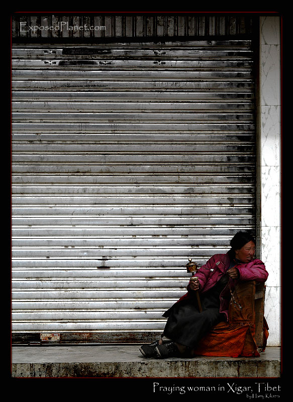 Praying woman in Xigar, Tibet