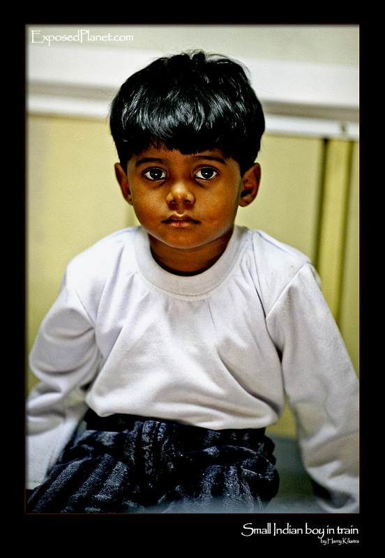 Little boy in train, India