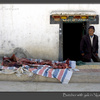 Butcher with yak meat in Nyalam, Tibet