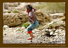 Global culture (2): little girl jumping puddles in Tibet
