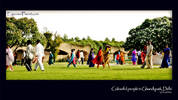Colourful people in Ghandi memorial park, New Delhi, India