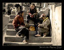 Street kids in Nyalam, Tibet emptying jam jars