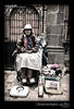 Tipping the scales: Woman selling stuff on the streets of Cusco, Peru